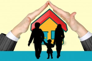 family walking towards house